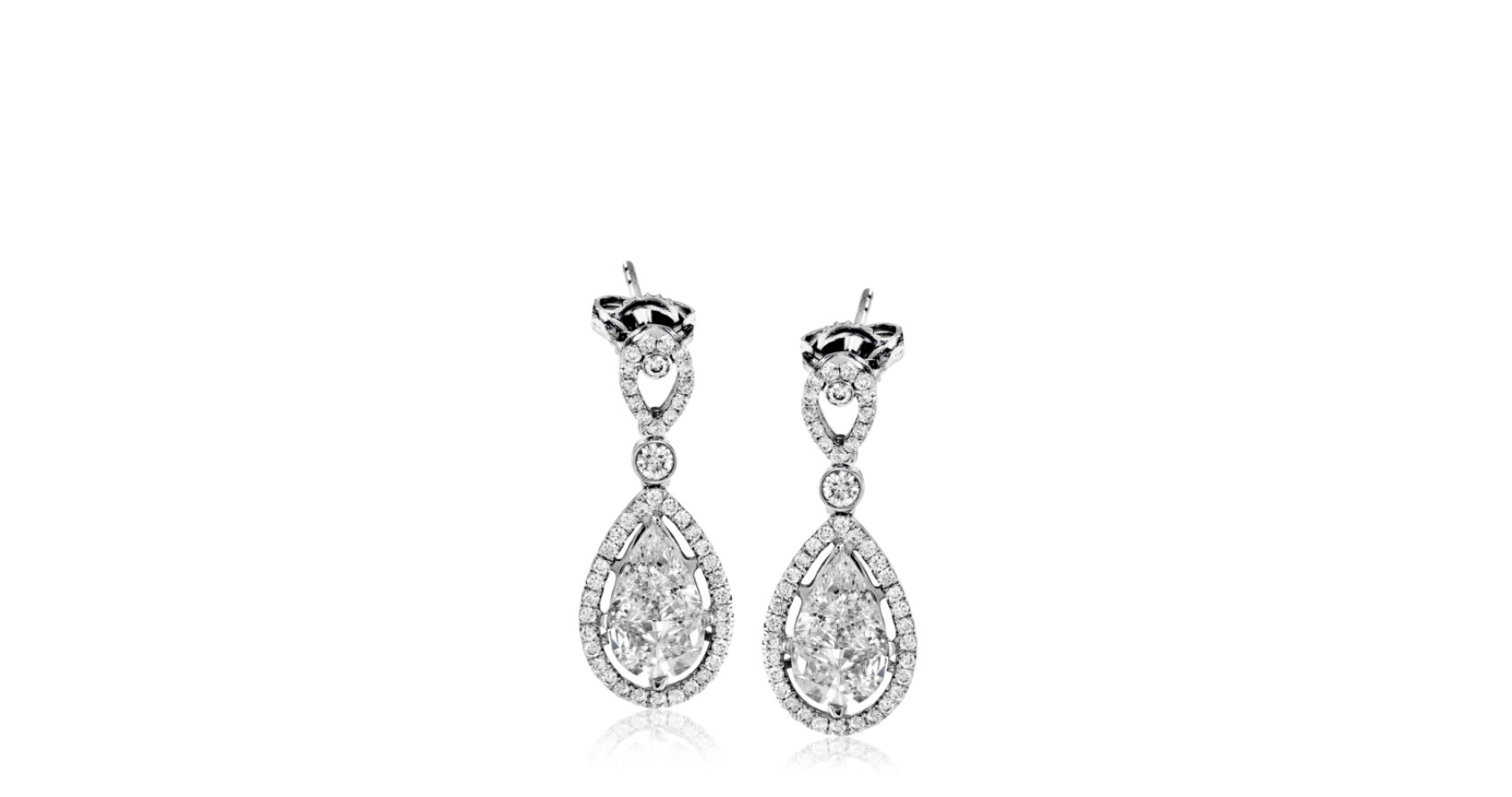 This elegant drop earrings have a vintage-inspired design that contains .57 ctw of round diamonds which frame centers of 1.94 ctw of mosaic set diamonds