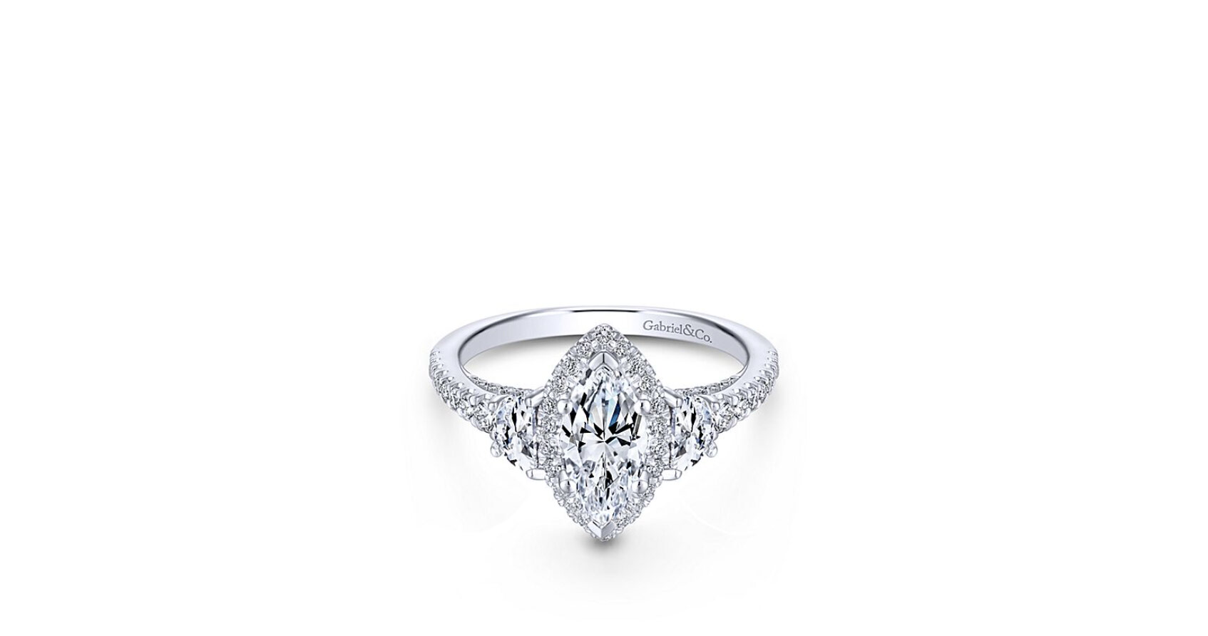 This marquise cut engagement ring boasts a diamond halo as well as a pair of glittering side stones. Finished with pave diamonds along the band and gallery